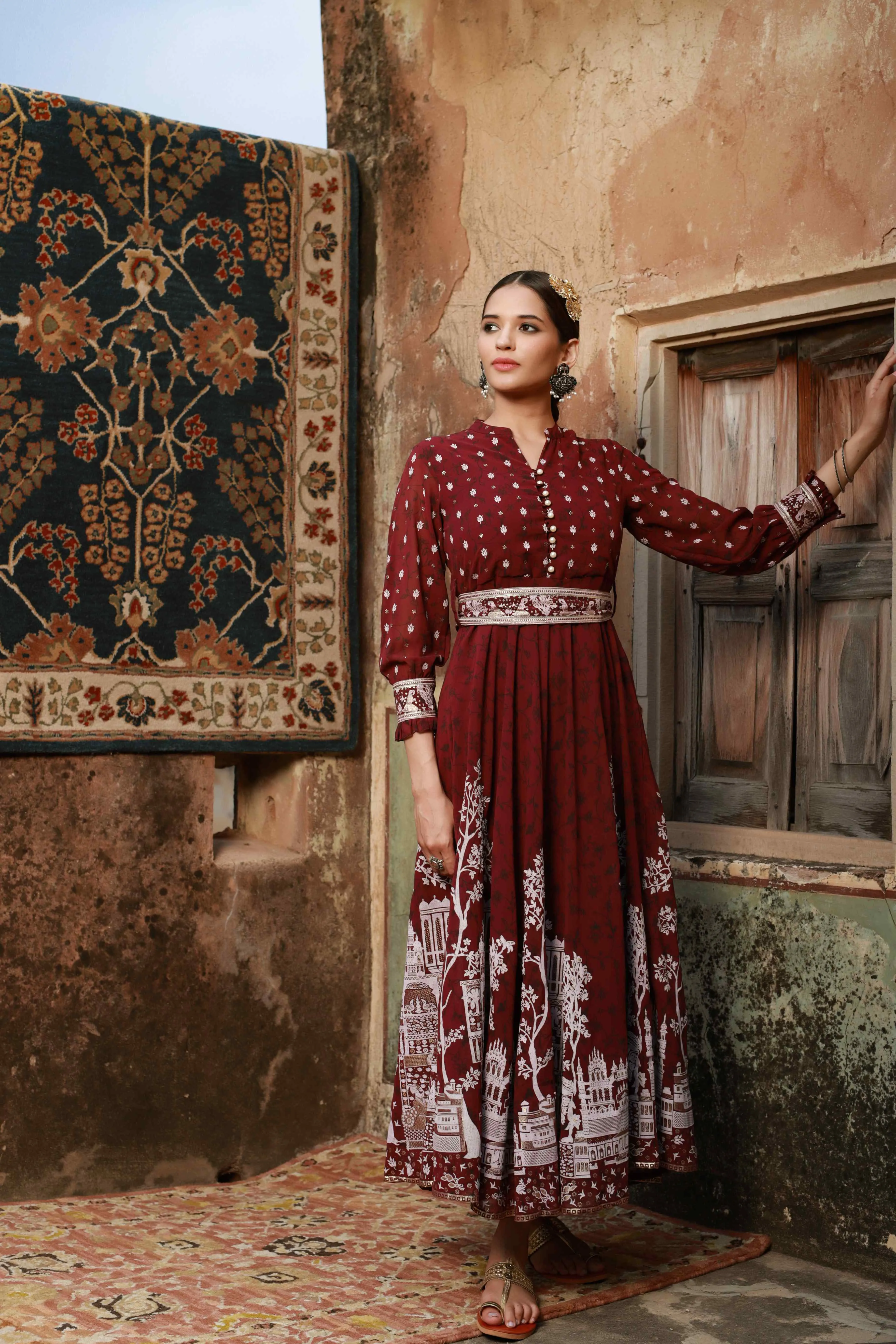 Jashvi Wine Ethnic Motif Printed Georgette Flared Maxi Dress.